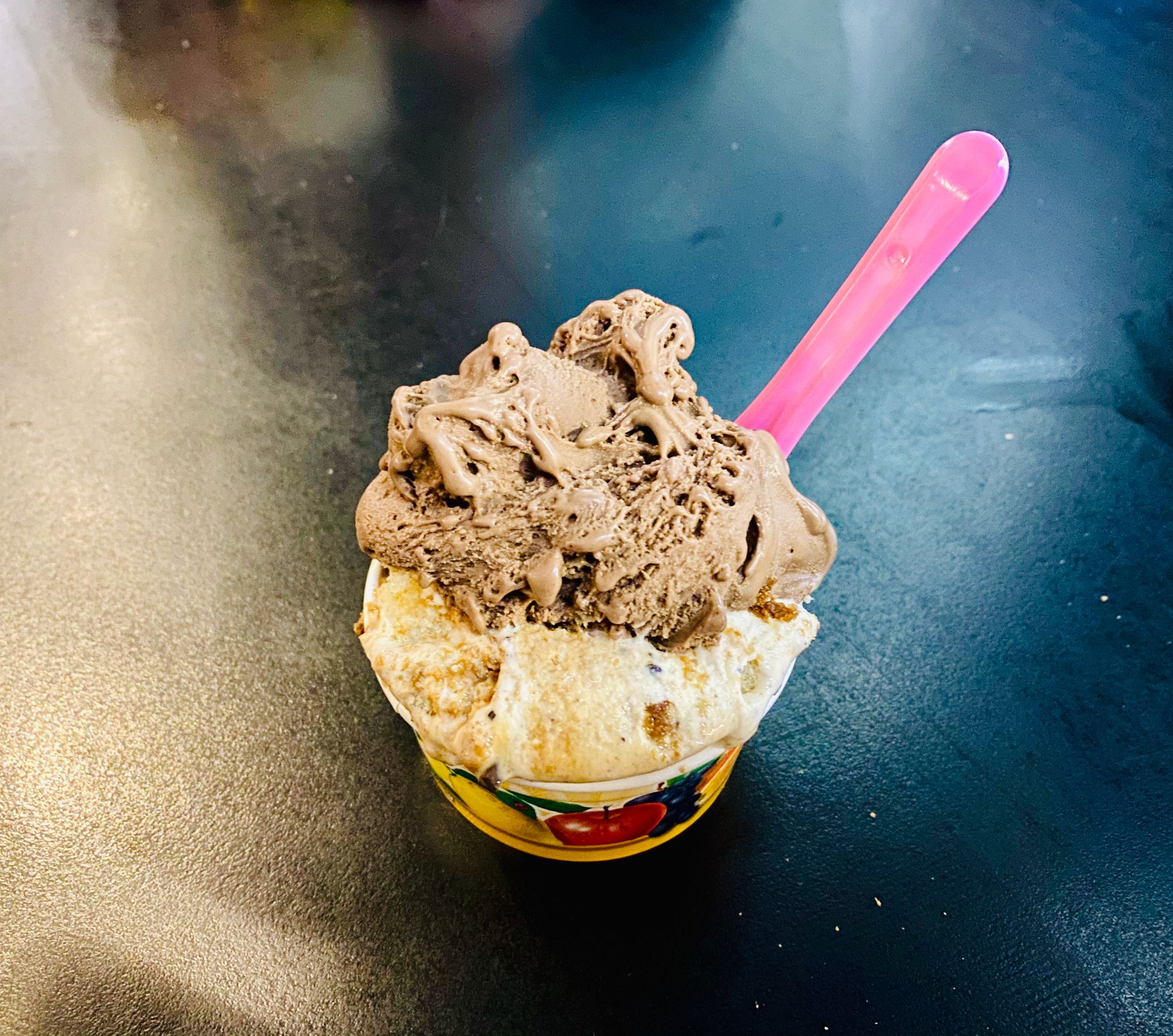 A photo of gelato in a small cup.