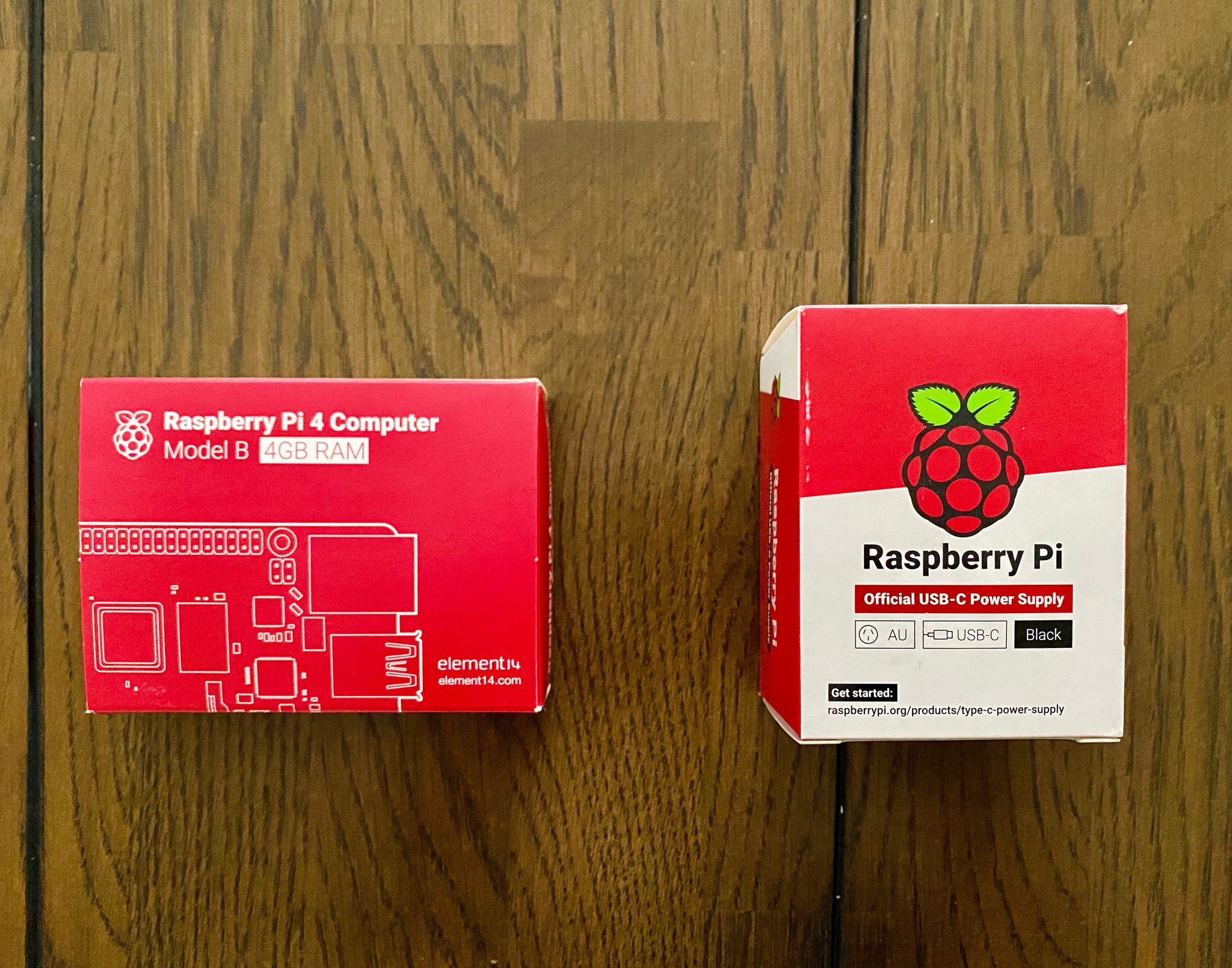 A photo of the box of a 4GB Raspberry Pi 4 and official power supply.