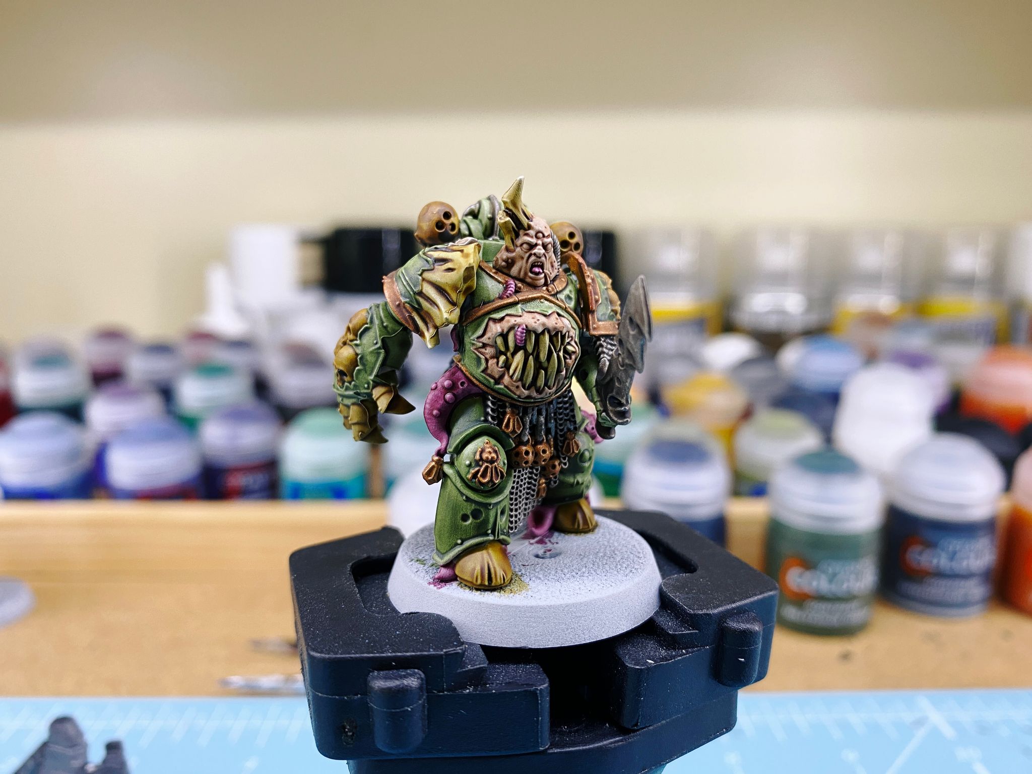 A photo of a Plague Marine from Warhammer 40,000. He's fully painted except for drybrushing and the base, and it looks like there's been layers of paint and washes, except there hasn't been thanks to the magic of Contrast paint!