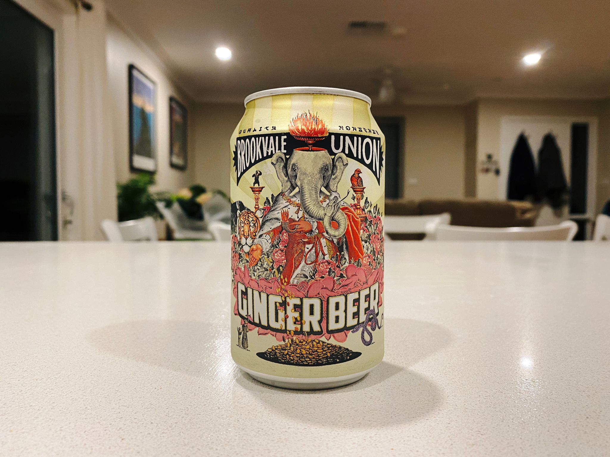 A photo of a can of alcoholic ginger beer. It's very colourful and has an almost Hindu-looking elephant on the front of it.
