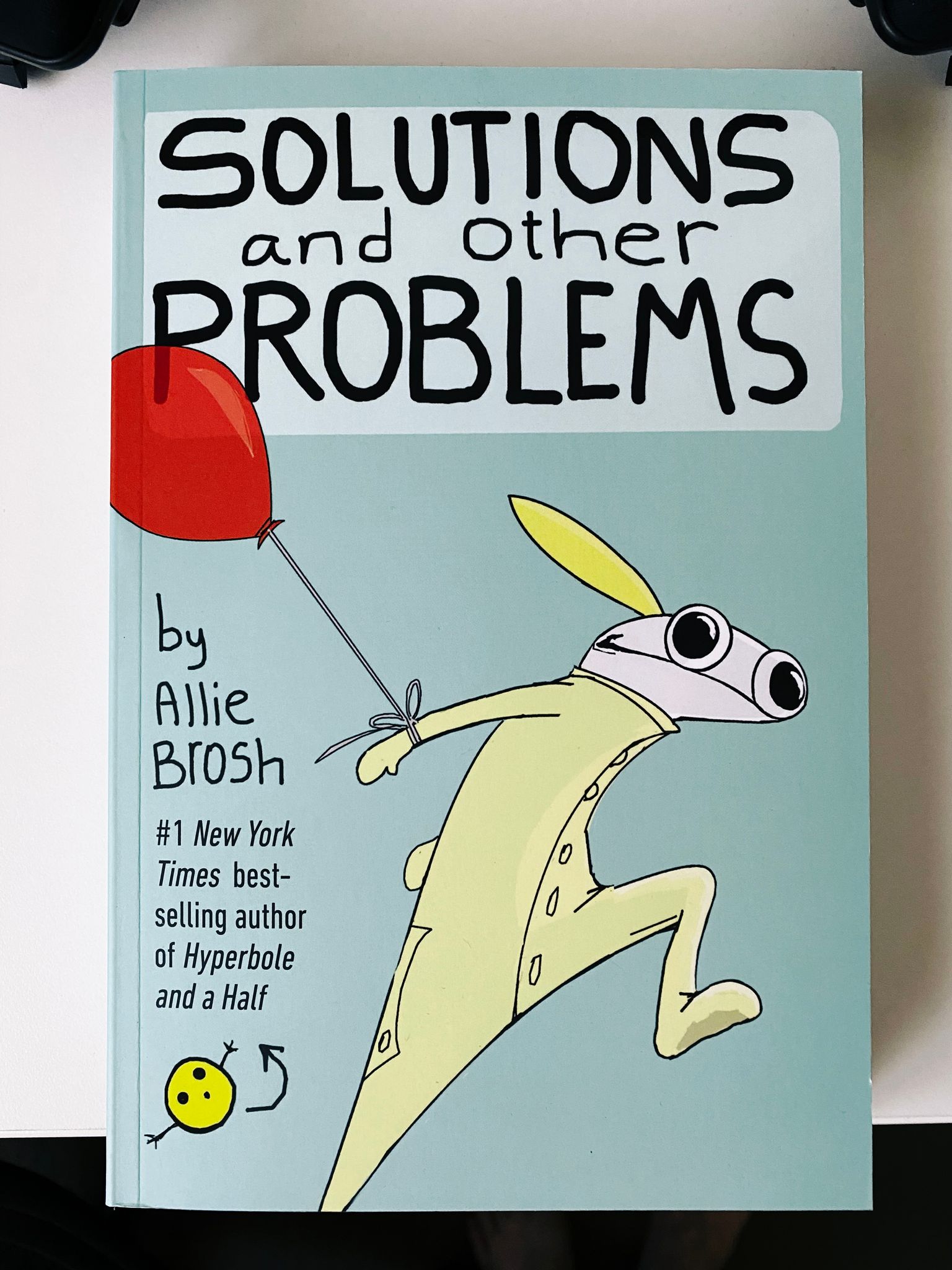 A photo of the cover of Allie Brosh's new book "Solutions And Other Problems".